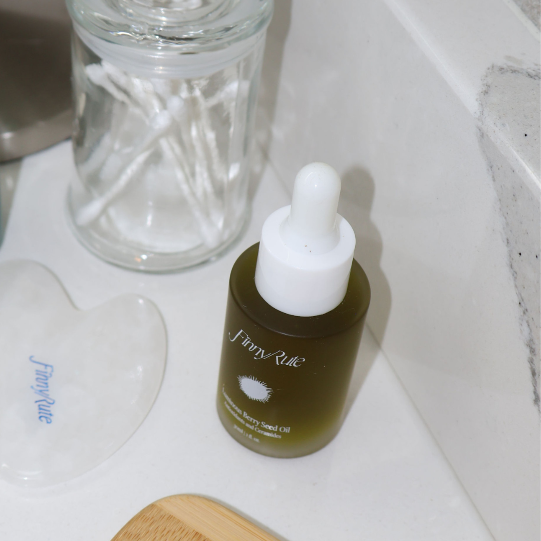 Fanny Rule skincare bottle with dropper on a white surface